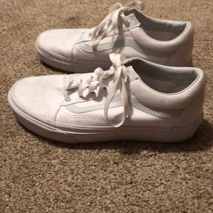 All white old skool Vans